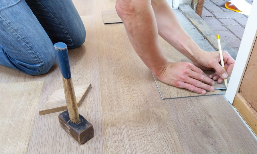 What factors should be considered when choosing flooring for a busy retail store?